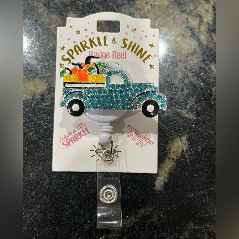 Sparkle & Shine Badge Reel with Blue Truck & pumpkins, new!